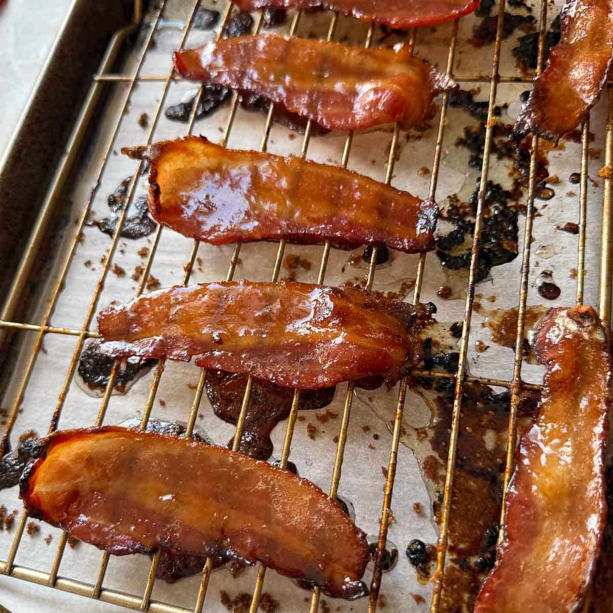 candied bacon on rack before seasoning.