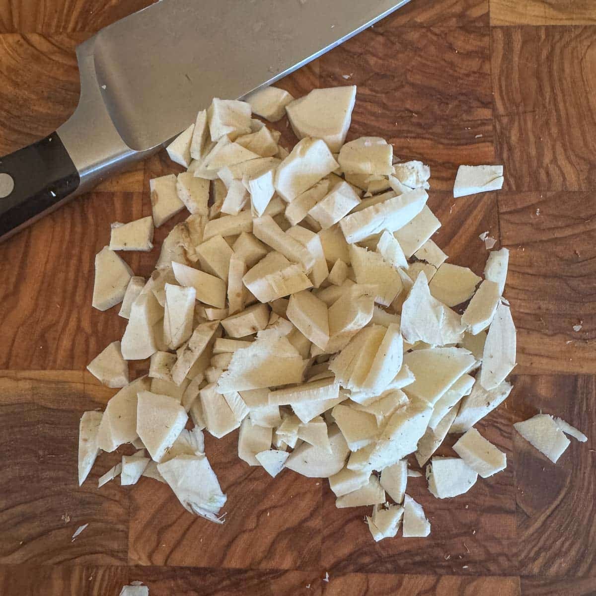 chopped horseradish on a cutting board.