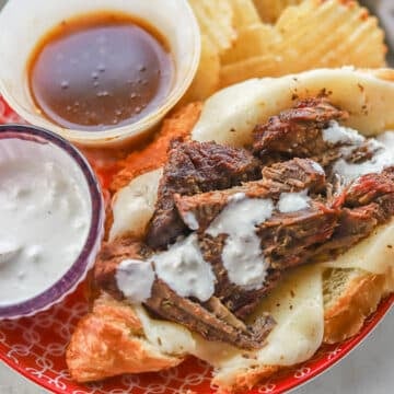 beef sandwich with chips, and horseradish sauce