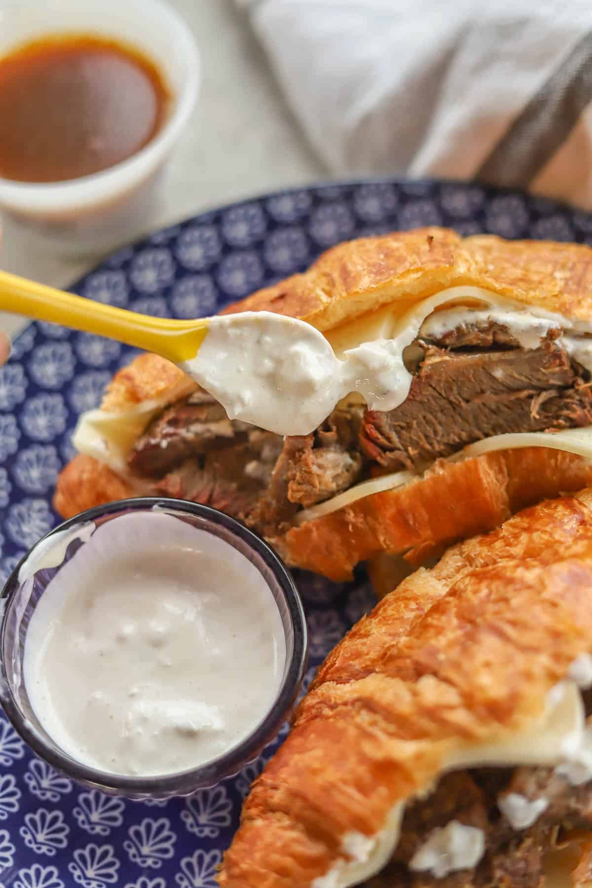 two sandwiches with horseradish sauce